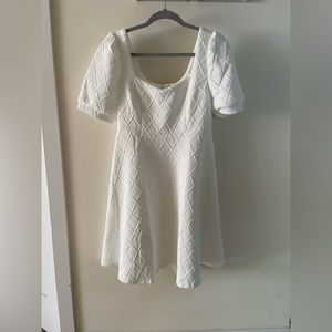 The Solid Textured Puff Sleeve Mini Dress